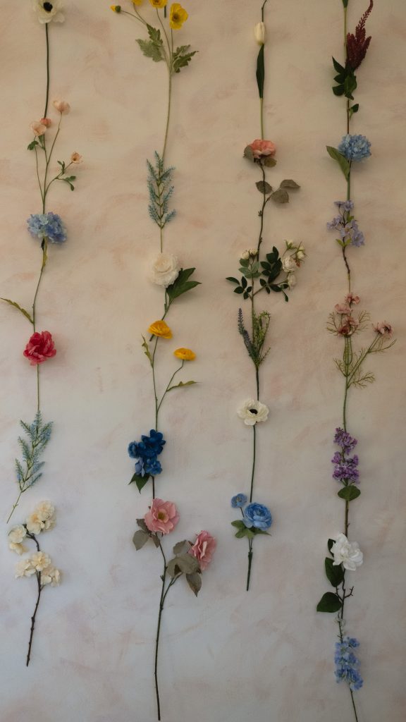 a cute floral wall at And Some Flower Cafe 