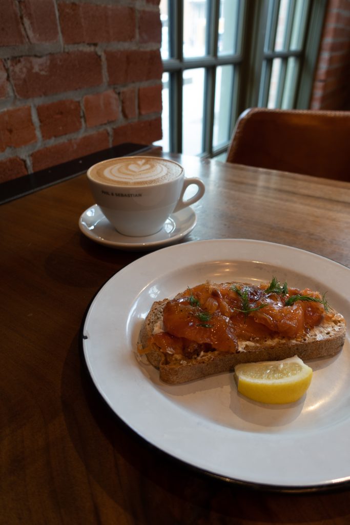 salmon toast and vanilla latte at phil & sebastian calgary