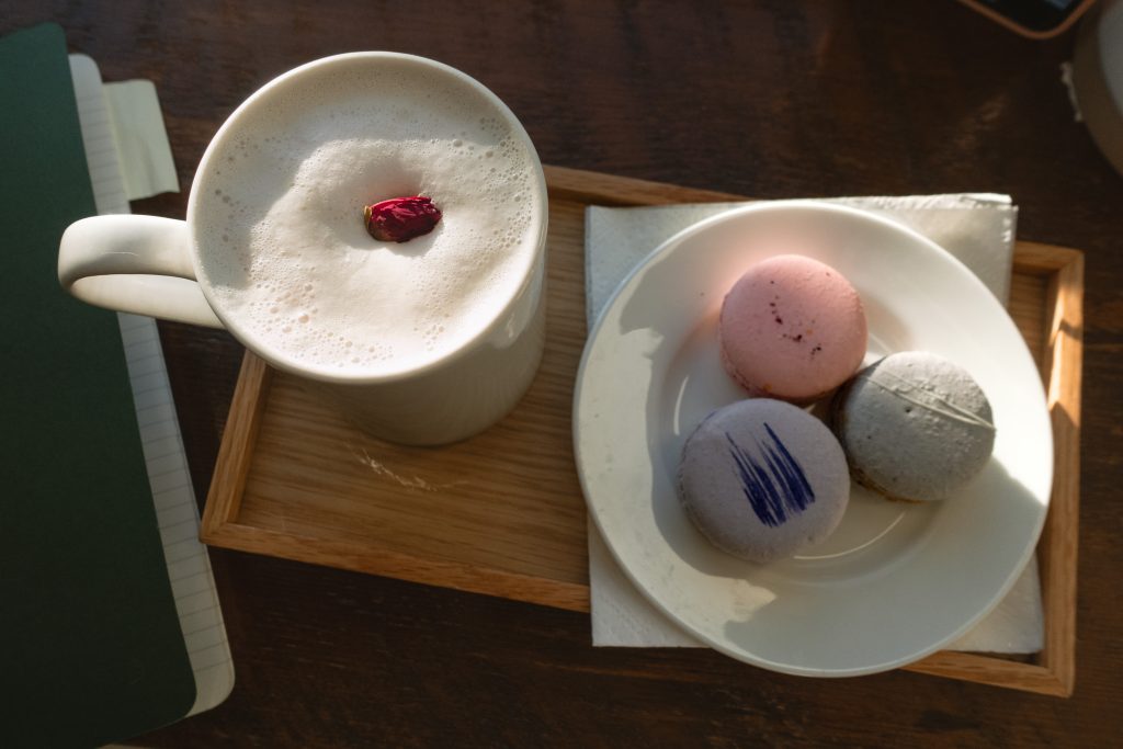 Cute rose latte macrons at And Some Flower Cafe in Calgary