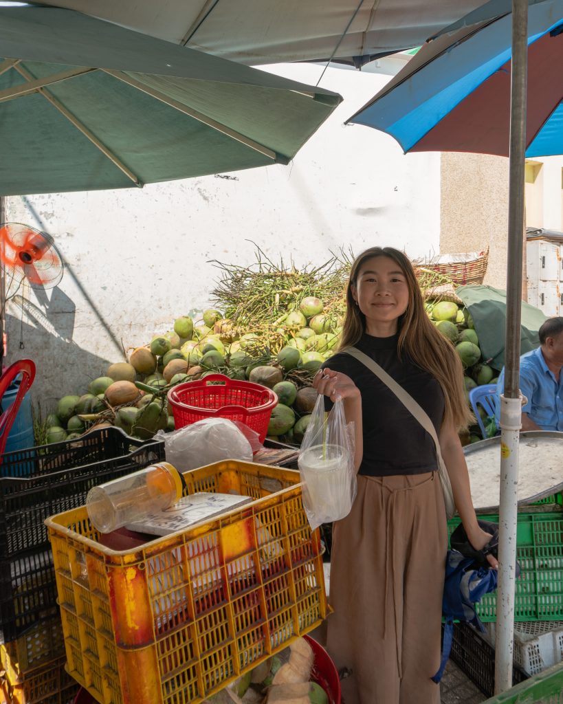 Buying-fresh-iced-coconut-drink-in-Viet-Nam