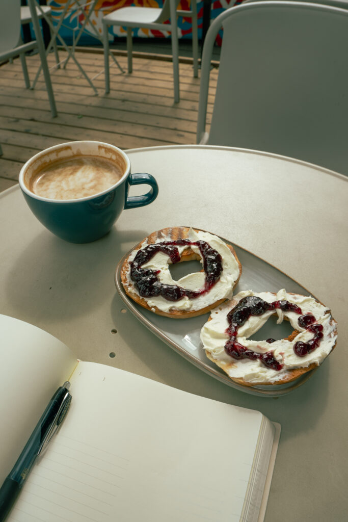 a cool coffee shop in inglewood called Neighbour - featuring a cream cheese and jam bagel with an oat vanilla latte